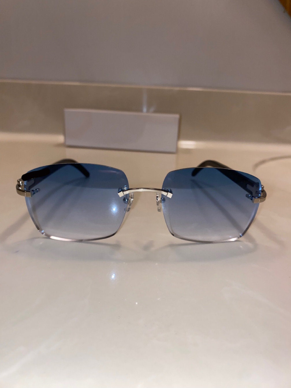 Rimless buffs Sunglasses